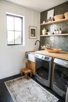 a washer and dryer in a small room