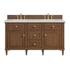 a double sink vanity with two faucets on the top and one drawer below