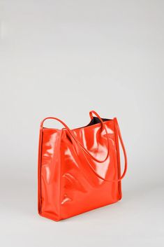 Shop for Orange high shine PVC tote bag at Glassworks London. Free UK shipping for orders over £75. Buy Now Pay Later with Klarna. 90s Inspired Fashion, London Bag, Uni Bag, Dopamine Dressing, Red Jelly, London Bags, London Free, Orange Fashion, Inspired Fashion