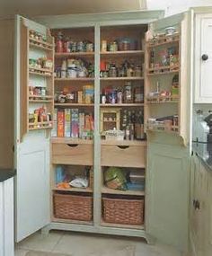 an open pantry with lots of food in it