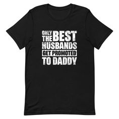 a black t - shirt that says, only the best husbands get promote to daddy