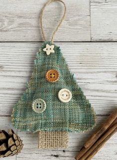 a christmas tree ornament with buttons on it