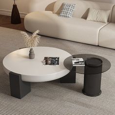 a living room with a white couch and coffee table