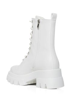 Seriously classic, and easy to style. The AZALEA WANG Siriusi Bootie In White is brought to you in a sleek faux leather upper and features a lace-up shaft, tonal stitching, silver metallic hardware, a durable stacked rubber outsole, and a round toe silhouette. Complete with a mid-calf shaft, a platform lug sole with a coordinating chunky heel, a back ankle pull tab, and an inner ankle zipper closure for optimal support. From skater dresses to an oversized tee with your favorite denim, the possibilities are endless when styling these go-to beauties.
(all measurements are approximate from size 7.5)
- Faux Leather Upper
- Almond Toe
- Mid-Calf Shaft
- 2.5” Heel Height
- 1.5” Sole Height
- 7” Shaft Height
- 11.25” Circumference
- Imported
Product ID: 379072 White Leather Shoes, Shoe Boot, Azalea Wang, Leather Boot Shoes, Skater Dresses, White Boots, Oversized Tee, Lug Sole, Pull Tab