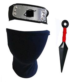 a black mask with a red handle and an umbrella attached to the head, next to a knife