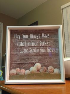 there is a sign that says may you always have a shell in your pocket and sand in your toes