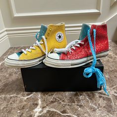 New And Never Worn! My Husband Got These As A Gift But They’re Not His Size. Comes With White Laces And Optional Blue Sparkly Laces. Converse J.W. Anderson High Top Sneakers Blue, Red & Yellow Printed Round-Toes Lace-Up Closure At Uppers Includes Dust Bag Casual Multicolor Glitter Sneakers, Le Fleur Shoes, Golf Le Fleur Shoes, Converse Chuck Taylor Lugged, Chuck Taylor Lugged, Golf Le Fleur Converse, Converse Chuck Taylor 70, Chuck Taylor 70, Black High Top Shoes