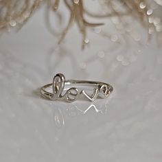 Script Love Ring, Sterling Silver, Dainty Love Ring, 925 Stamped, Non Tarnish, Top Of Ring Height: 7.8m Top Of Ring Width: 17.5mm Band Width: 1.6mm Shank Width: 1.6mm Metal: 925 Sterling Silver Plating: Rhodium Plated Finish: High Polish 925 Stamped K E E P I N T O U Ch Https://Instagram.Com/Emmaverajewelry Https://Www.Facebook.Com/Emmaveradesign Thank You For Visiting Love Ring, Womens Jewelry Rings, Rhodium Plated, Jewelry Art, Diy Jewelry, Sterling Silver Rings, Handmade Jewelry, Plating, 925 Sterling Silver