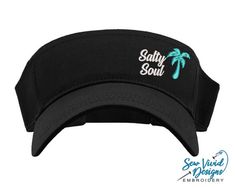 Save 20% off your first purchase by signing up at https://signup.sewvividdesigns.comThis lightweight and comfortable visor features Salty Soul with a palm tree embroidered on your choice of visor. For more font options, send me a message and we will find the perfect font for you!Visor featured in photo: BlackPalm Tree Color in photo: Aqua🧢 Visor Details 🧢-One size fits most-Pre-curved visor-100% cotton-Hook and loop adjustable closure (Velcro)-Visor panel height 2.25"-Visor Bill length 2.75" Gigi Gifts, Sold Real Estate, Salty Soul, Real Estate Agent Gift, Custom Embroidered Hats, Vacation Hat, Gigi Gift, Golf Visor, Real Estate Gifts