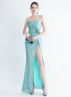 Life's no gala without a great gown! Dance the night away in this mermaid silhouette prom dress. The spaghetti straps lead to a shimmering sea of mint green sequins that cascade down to the floor-length hem, reflecting the moonlight with every step you take. The carefully crafted pleats add a touch of elegance as they swim amidst the sea of shimmer, while a bouquet of 3D flowers nestles gracefully on your waist, hinting at the magic of spring. The daring high slit is a gateway to adventure as you glide across the dance floor. Itnot just a gown; it's your fairy tale waiting to unfold! Luxury Birthday Party, Beaded Party Dress, Summer Dress Women, Luxury Birthday, Princess Wedding Dress, Dress Women Elegant, Evening Dress Fashion, Sequin Party Dress, Birthday Party Dress