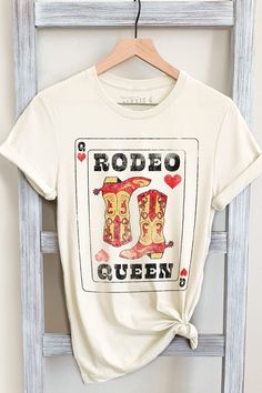 RODEO QUEEN GRAPHIC TEE     Our Shirts are Authentically Designed and Hand Screen Printed for Best Quality    *Process where the ink is dyed into the shirt and graphic will not peel away     -Proudly Hand Pressed in Los Angeles, CA.     -30 Singles. 100% Washed Cotton     -Comfortable and Very Soft    -Style by Rolling up the Sleeves, Tie a Side Knot, Front Tuck...       SIZE AND FIT      *Please refer to the last photo option for measurements    WASHING AND CARE    -Machine Wash with Like Color Cowgirl T Shirts, Western Outfits Mens, Western Tee Shirts, Rodeo Tshirt, Cowgirl Bachelorette Shirts, Trajes Country, Girl Trip, Cowgirl Bachelorette, Bachelorette Shirt