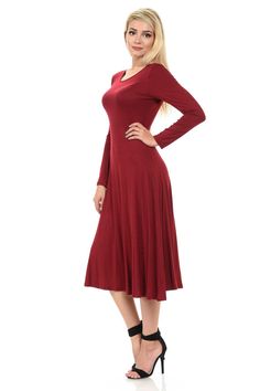 Flatter your figure with a dress that follows your curves. Soft and stretchy fabric keeps you comfortable all day long. This versatile dress features rounded neckline, long sleeves, A-line silhouette and midi length. It is made of soft jersey knit that has great drape and stretch. 95% Rayon 5% Spandex Imported Model is wearing size Small. Her height is 5’7”. Hand wash cold. Do not bleach. Hang Dry. Burgundy Midi Dress, Versatile Dress, Versatile Dresses, Bell Sleeve Dress, Long Sleeve Midi Dress, Dressed Down, Black Midi Dress, Elegant Dress, Midi Length