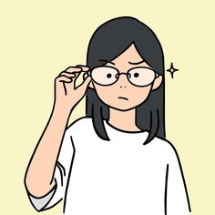 a woman wearing glasses is looking at her hair