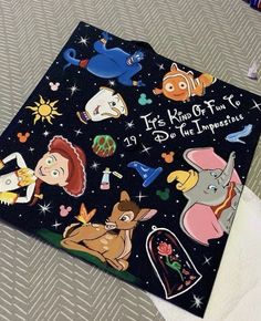 an open notebook with cartoon characters on it