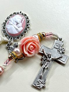 "Welcome to my Shop \"CREATING STILL MOMENTS.\"   To see all my listings and offerings, please visit my shop at  https://www.etsy.com/shop/CreatingStillMoments?ref=sh-carousel-1  Handmade Rosary | Pocket Rosary | Cameo rosary| Ombré Pink beads Madonna of the Streets Pink rose, Catholic mom, catholic gift, RCIA gift Light Pink and Black Madonna of the Streets Pocket Rosary, Light Pink and Black beads, Pink rose, Christmas gift Confirmation gift RCIA gift   These rosaries are beautiful and would m Spiritual Rosary As Valentine's Day Gift, Mother's Day Rosary With 8mm Beads, Mother's Day Gift Rosary With 8mm Beads, Pink Rosary With Miraculous Medal As A Gift, Beautiful Rosaries, Blue Rosary, Black Madonna, Pocket Rosary, Handmade Rosary