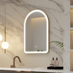 a bathroom with marble counter top and white walls, lighted by an oval mirror above the sink