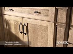 a kitchen with wooden cabinets and metal pulls on the door knobs, in an advertisement for schiller furniture