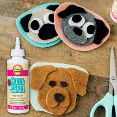 the supplies needed to make this dog craft include scissors, glue and felt