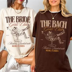 two women wearing matching t - shirts with the bride and groom on them are posing for a photo