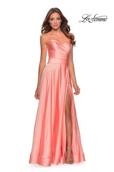 Wear this sweet gown to Prom 2020 ! This gown designed by La Femme,28608, features a strapless sweetheart neckline with a side pleated bodice that leads into a closed zipper back. A satin skirt with a side leg slit. Flowy Prom Dresses, Simple Prom Dress, Prom Dress Stores, Prom Dress Styles, Prom Style, Prom Designs, Designer Prom Dresses, Ruched Bodice, Satin Gown