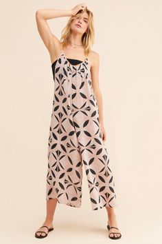 Rent Geometric Printed Jumpsuit from Nuuly. Pick 6 items for $98/month. Free shipping + returns. Four Tops, Community Of Women, Clothing Brands, Printed Jumpsuit, Iconic Women, Premium Denim, Jumpsuit Romper, Urban Outfitters, Anthropologie