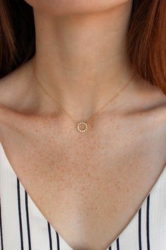 A petite crystal set 'halo' is suspended from a minimalist diamond cut chain. - Closure: Lobster clasp. - Materials: 14k Gold Fill or Sterling Silver - Choose your length from drop down, 15" + a 2" extender or 18" + a 2" extender - Handmade in Corning, NY #daintydiamondnecklace Elizabeth Jewelry, Horn Pendant Necklace, Everyday Jewellery, Halo Necklace, Swarovski Necklace, Minimal Jewelry, Crystal Set, Circle Necklace, Crystal Necklace Pendant