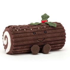 Jellycat Amuseable Yule Log.

A Yule log is a dessert served near Christmas.

Traditionally made of sponge cake, frosted with chocolate buttercream to look like tree bark and festooned with decorations.

This little beauty is made from fabrics and has the added cuteness with a smiley face and little cordy roy feet, a real festive treat! Christmas Yule Log, Yule Log, Christmas Plush, Farm Yard, Yule, Christmas Cheer, Poinsettia