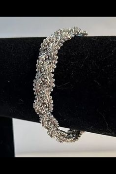 Please see all photos. Bracelet weighs 34 grams of 925 Sterling Silver. Makers stamped. Elegant Oxidized Bangle Chain Bracelet, Silver Bangle Chain Bracelet With Intricate Design, Formal Sterling Silver Bangle With Oxidized Finish, Chain Link Bracelet, Link Bracelets, Chain Link, Sterling Silber, Jewelry Bracelets, Braids