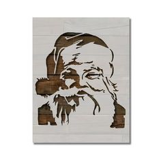 a wooden cutout of an old man with a beard and mustache on it's face