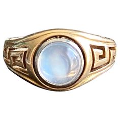 Details: Awesome vintage greek moonstone ring. Both shoulders have pierced greek key work. Around the center is also pierced half circles. This surrounds a stunning moonstone! There is so much life and glow to this stone. A fine A grade example. Hallmarked 14 with a makers mark and tested to insure the metals purity. Ring is a size 8 1/2 and would look great on a man or a woman. In lovely ready to wear condition. Please ask all questions prior to placing an order! Please ask all necessary questi Greek Ring, Purity Ring, Ring Rosegold, Ring Art Deco, Half Circle, Greek Key, 14k Gold Ring, Moonstone Ring, Solitaire Ring