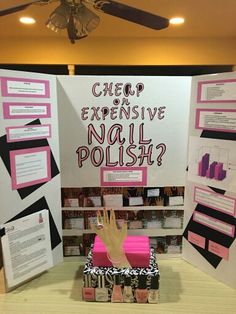 a display with pink and black items on it's sides, including a sign that says cheap expensive nail polish?