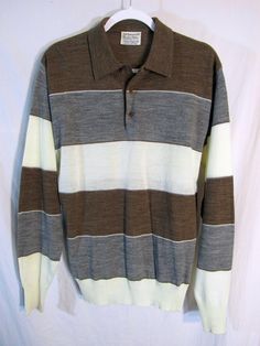 "The quintessential 70's sitcom shirt! It's a 1970s Vintage Mister Man Men's Long Sleeve 2ply Knit Pullover Shirt, in fact. Measured Size 22.5\" P2P (tag size XL), Cream / Brown / Gray Dig those stripes! Condition: ready for Jack Tripper. AS close to unworn as I've seen, and smoke free. Dig the 70'S well you'll dig my store - check it out! Measurements: Label size: Extra Large Shoulder-to-shoulder: 18.5\" Chest across: 22.5\" Waist across: 20\" Bottom hem across: 14\" relaxed Sleeve from shoulde Vintage Cotton Polo Sweater For Fall, Retro Cotton Collared Sweater, Retro Collared Cotton Sweater, Vintage Polo Sweater With Ribbed Collar, Vintage Cotton Polo Sweater With Ribbed Collar, Retro Brown Long Sleeve Shirt, Retro Long Sleeve Cotton Polo Sweater, Vintage Striped Polo Collar Tops, 70s Mens Tshirts