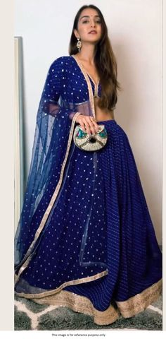 Bollywood Replica LehengaBollywood Model Blue color georgette designer lehenga With Digital Print With Heavy Sequence Work Border(Semi stitched : 5 mtr Flare With Cancan).Choli Fabric in Soft Georgette Fabric With Digital Print With Work Lace(Unstitched) Dupatta in Soft Net Fabric With Sequence Work. Semi stitched outfit that can be stitched to sizes till 42 inch size.Shipping time 5-7 days .Buy this Saree at Kollybollyethnics and make your occasion very special !!. With Express Free S Blue Georgette Saree Set, Diwali Anarkali Georgette Lehenga, Anarkali Georgette Lehenga For Diwali, Anarkali Style Georgette Lehenga For Diwali, Blue Sets With Sheer Dupatta For Diwali, Blue Self-design Georgette Lehenga, Designer Blue Choli With Mirror Work, Semi-stitched Self Design Georgette Lehenga, Blue Choli With Mirror Work For Navratri