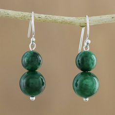 Featuring green spheres of quartz these beaded dangle earrings bring the beauty of the jungle to your wardrobe. Thai artisan Matta designs the earrings dangling from sterling silver hooks. Sterling Silver Jewelry With Green Dangling Beads, Elegant Green Gemstone Beaded Earrings, Green Gemstone Bead Drop Earrings, Green Gemstone Beaded Round Earrings, Green Gemstone Beads Round Earrings, Green Jade Beaded Drop Earrings, Green Jade Dangle Beaded Earrings, Green Round Gemstone Bead Earrings, Elegant Green Jade Beaded Earrings