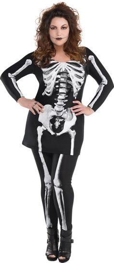 a woman dressed in skeleton costume posing for the camera with her hands on her hips