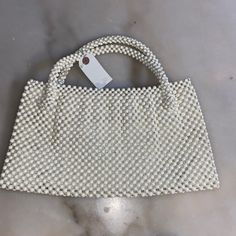 Brand New, Never Used, In Absolute Perfect Condition!!! This Elegant, Vintage, Hand-Woven, Top-Handle (2) Pearl-Beaded Clutch Has A Braided Styling With Delicate White Faux Pearls Embellished All-Over, This Luxury Handbag Is Perfect For Day-To-Night Accessorizing. The Stylish Pearl Clutch Features A Rectangular Silhouette With Two Beaded Carry Handles. The Interior Is Pristine With A Cream Satin Lining And A Side Pocket. Match It With Your Outfit And Create A Long-Lasting Impression To Your Next Luxury Rectangular Clutch With Pearl Embellishments, Denim Wristlet, Coach Coin Purse, Kate Spade Clutch, Pearl Clutch, Purse Insert, Metallic Clutch, Pink Wristlet, Pink Purse