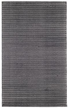 a black and white rug on a white background