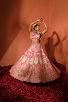 Showcasing an architectural pattern-inspired lehenga with mirror and thread embroidary. DELIVERY TIMEPlease allow 8-12 weeks for your outfit to arrive. FABRIC DETAILSRaw Silk Professional cleaning only. Pink Fitted Art Silk Lehenga, Embellished Pink Art Silk Lehenga, Pink Cutdana Art Silk Lehenga, Pink Unstitched Lehenga With Printed Motifs, Designer Pink Lehenga With Cutdana Detail, Architectural Pattern, Open Image, Professional Cleaning, Skirt Length