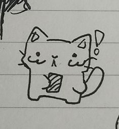 a drawing of a cat on lined paper