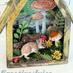 a small house made out of wood with mushrooms and plants