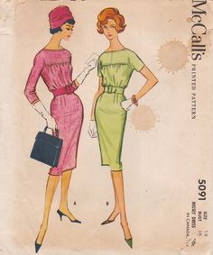 two women in dresses and hats are standing next to each other, one is wearing a hat