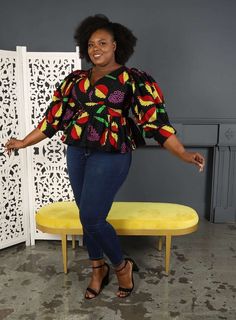 Look so sweet all seasons in the ZAIRE African Print Women’s Puff Sleeve Peplum Top! Rock this cute top that has a V-neckline, and ¾ balloon sleeves with a skirt or pant of your choice! Style with flats for a flirty casual look or dress is up with heels for a chic look. Description * African print V-neck peplum top * Fully lined * Overall top length about 23inches * Sleeve length about 18inches * Balloon Sleeves with 2 buttons closure * Zipper closure on the back * Made with African wax fabric ( African Peplum Top, Overall Top, Ankara Blouse, African Blouses, 4 Balloon, African Print Tops, Wax Fabric, African Pattern, Cute Top