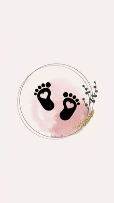 a pink circle with two black footprints in the center and gold glitter around it, on a white background