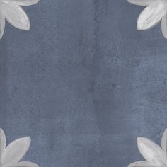 a blue rug with white flowers on the bottom and grey border in the middle that has been drawn onto it