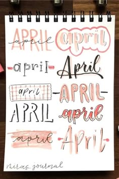 an open notebook with some writing on it and pink markers next to it that says, april