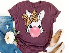 a women's t - shirt with an image of a giraffe on it