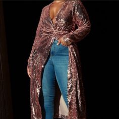 Just Stunningly Beautiful. The Cardigan Has A Sequin Belt To Tie Around The Waist. Can Be Dressed Up As A Jacket Or Dressed Down As A Glamorous Robe To Wear Around The House. It’s Warm Enough To Wear In The Fall And Winter Months For Any Occasion. 100% Polyester. Can Be Machine Washed, Hang To Dry. All Sequins Attached. Fall Sequin Cardigan For Night Out, Sequin Cardigan For Night Out In Fall, Glamorous Spring Cardigan For Parties, Long Sleeve Sequined Evening Cardigan, Chic Sequined Cardigan, Fitted V-neck Cardigan For Parties, Chic Long Sleeve Sequined Cardigan, Spring V-neck Outerwear For Night Out, V-neck Outerwear For Spring Parties