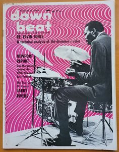 a magazine cover with a man playing the drums