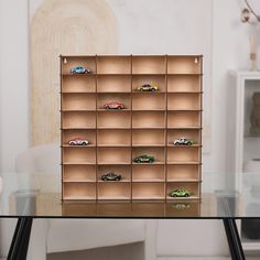 Wooden Toy Car Display Shelf | Wall-Mounted Storage for 32 Cars | 10 Color Options Organize and showcase your toy car collection with this stylish wooden toy car display shelf, expertly crafted from high-quality plywood. This wall-mounted shelf is perfect for car enthusiasts of all ages, providing a practical and decorative storage solution for up to 32 cars. Key Features: - Material: Durable plywood with a smooth finish. - Size: 20.6" x 20" x 2.9", designed to fit compactly on any wall. - Compa Toy Car Display, Diecast Cars Display, Toy Car Storage, Car Display, Car Organizer, Match Box, Car Holder, Display Shelf, Toy Organization