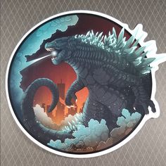 a sticker with an image of godzilla in the sky